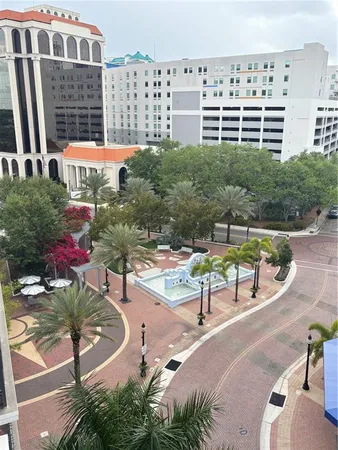 a view of a swimming pool with a patio