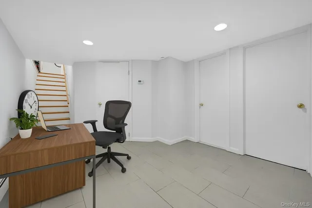a view of a storage & utility room with a sink