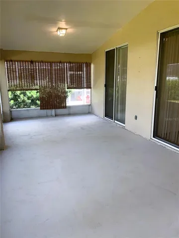 a view of swimming pool with a yard