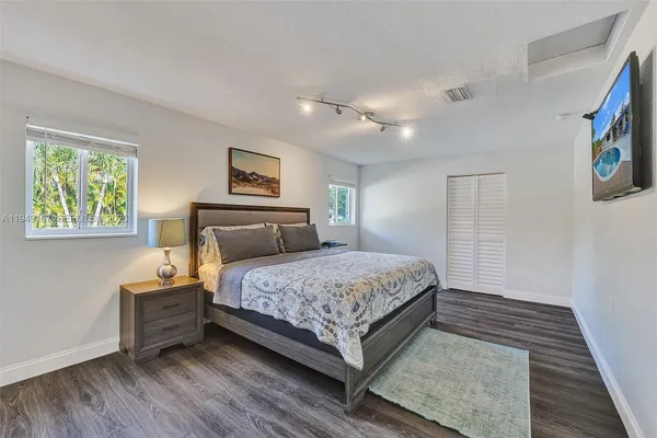 a view of swimming pool with lounge chair