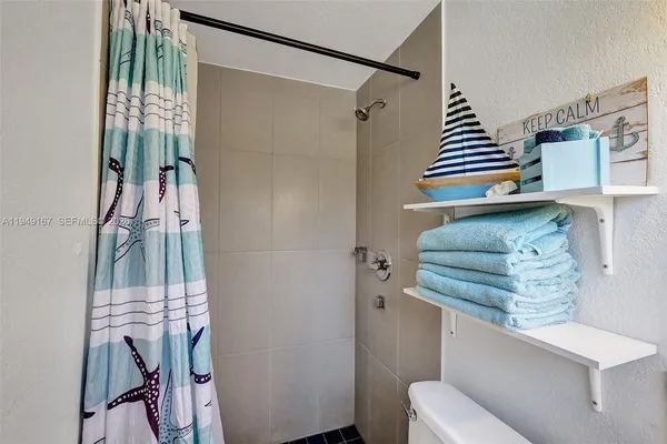 a view of a city with mountains in the background