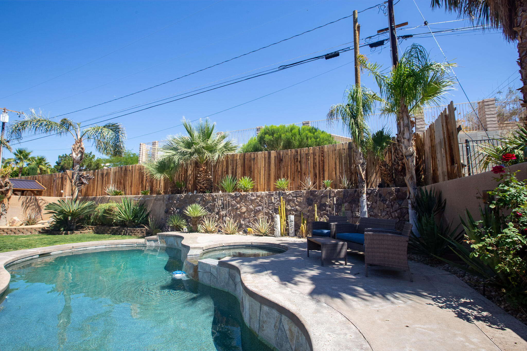 66862 San Rafael Road Desert Hot Springs, CA 92240 - Photo 11 of 33 a view of a backyard with plants and outdoor seating