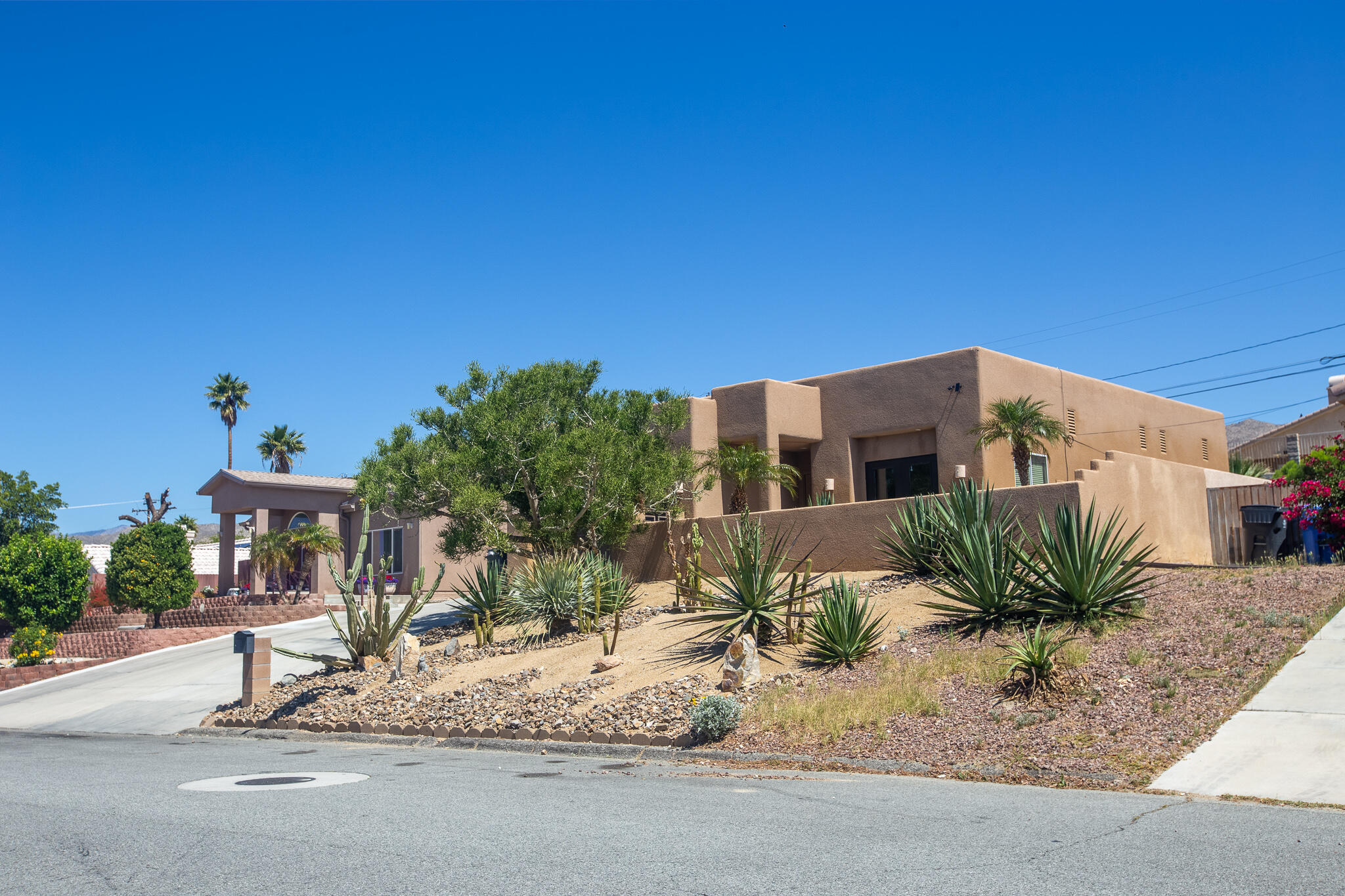 66862 San Rafael Road Desert Hot Springs, CA 92240 - Photo 2 of 33 a house view with a outdoor space