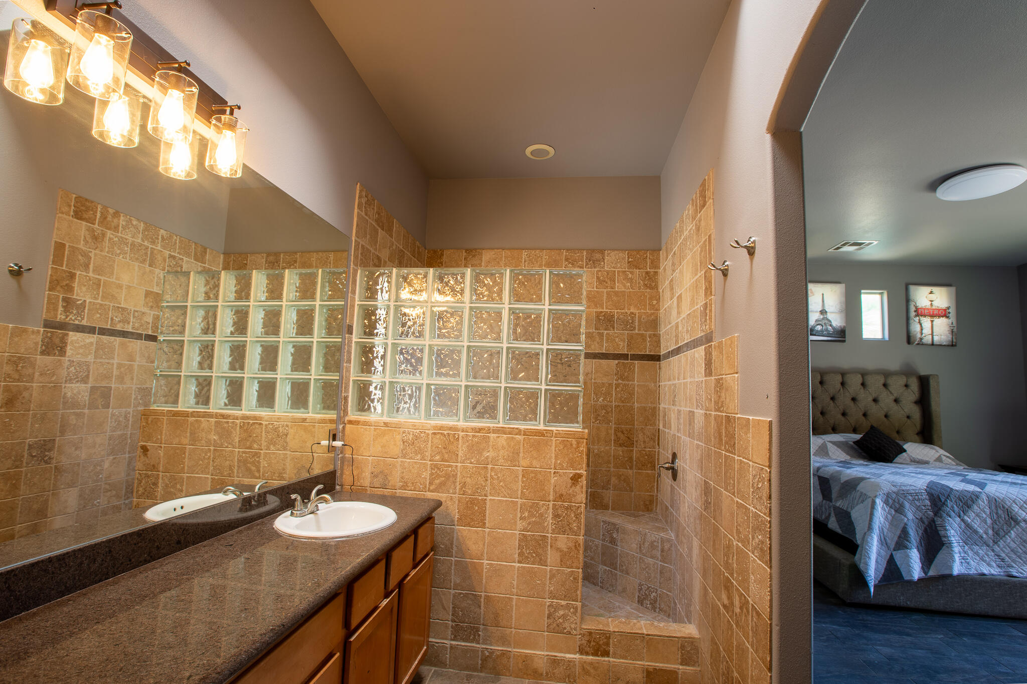 66862 San Rafael Road Desert Hot Springs, CA 92240 - Photo 25 of 33 a bathroom with a sink and a mirror