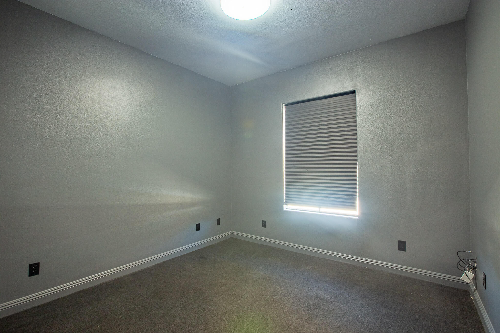 66862 San Rafael Road Desert Hot Springs, CA 92240 - Photo 28 of 33 an empty room with a window