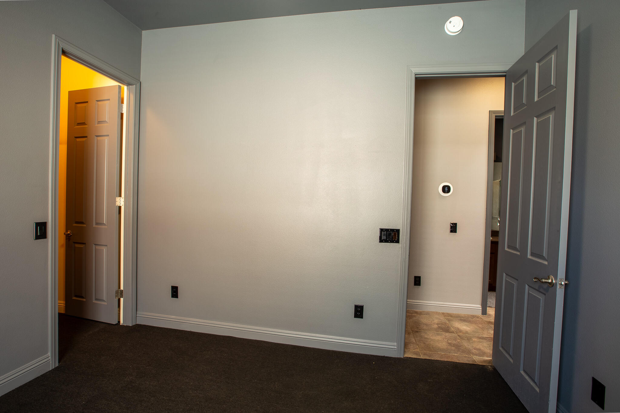 66862 San Rafael Road Desert Hot Springs, CA 92240 - Photo 30 of 33 an empty room with windows and closet
