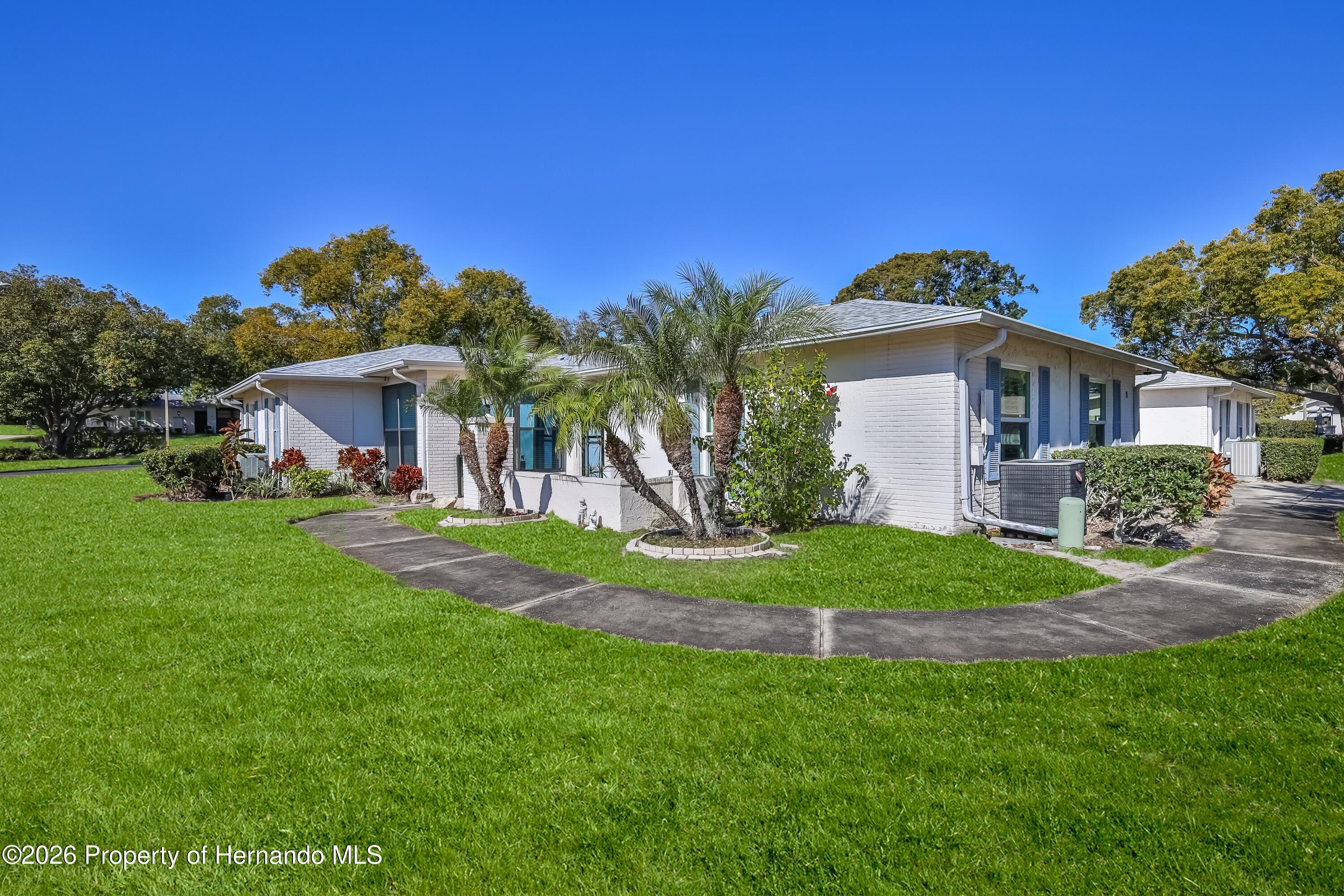 8141 Bugle Court, Unit 1 Port Richey, FL 34668 - Photo 3 of 33 5W1A0519-Edit