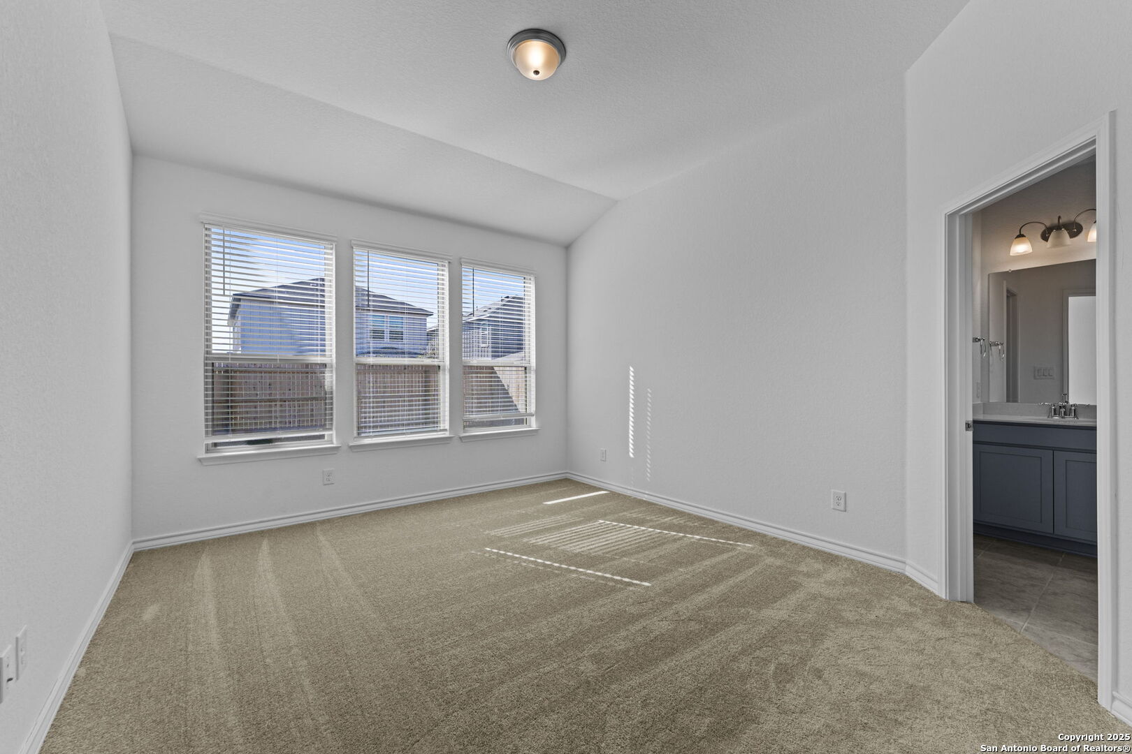 4040 Paddock Trail Seguin, TX 78155 - Photo 19 of 26 a view of an empty room with a window