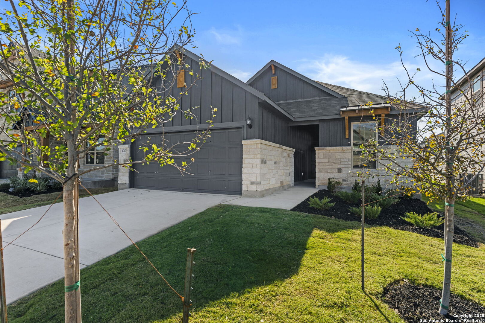 4040 Paddock Trail Seguin, TX 78155 - Photo 2 of 26 a view of a house with a yard