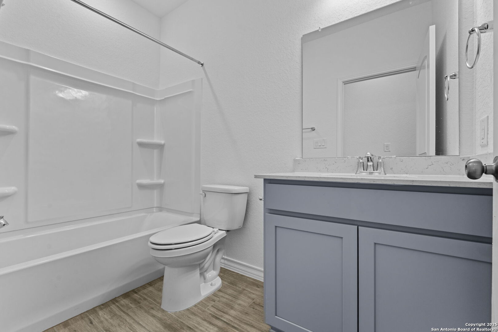 4040 Paddock Trail Seguin, TX 78155 - Photo 8 of 26 a bathroom with a sink toilet and shower