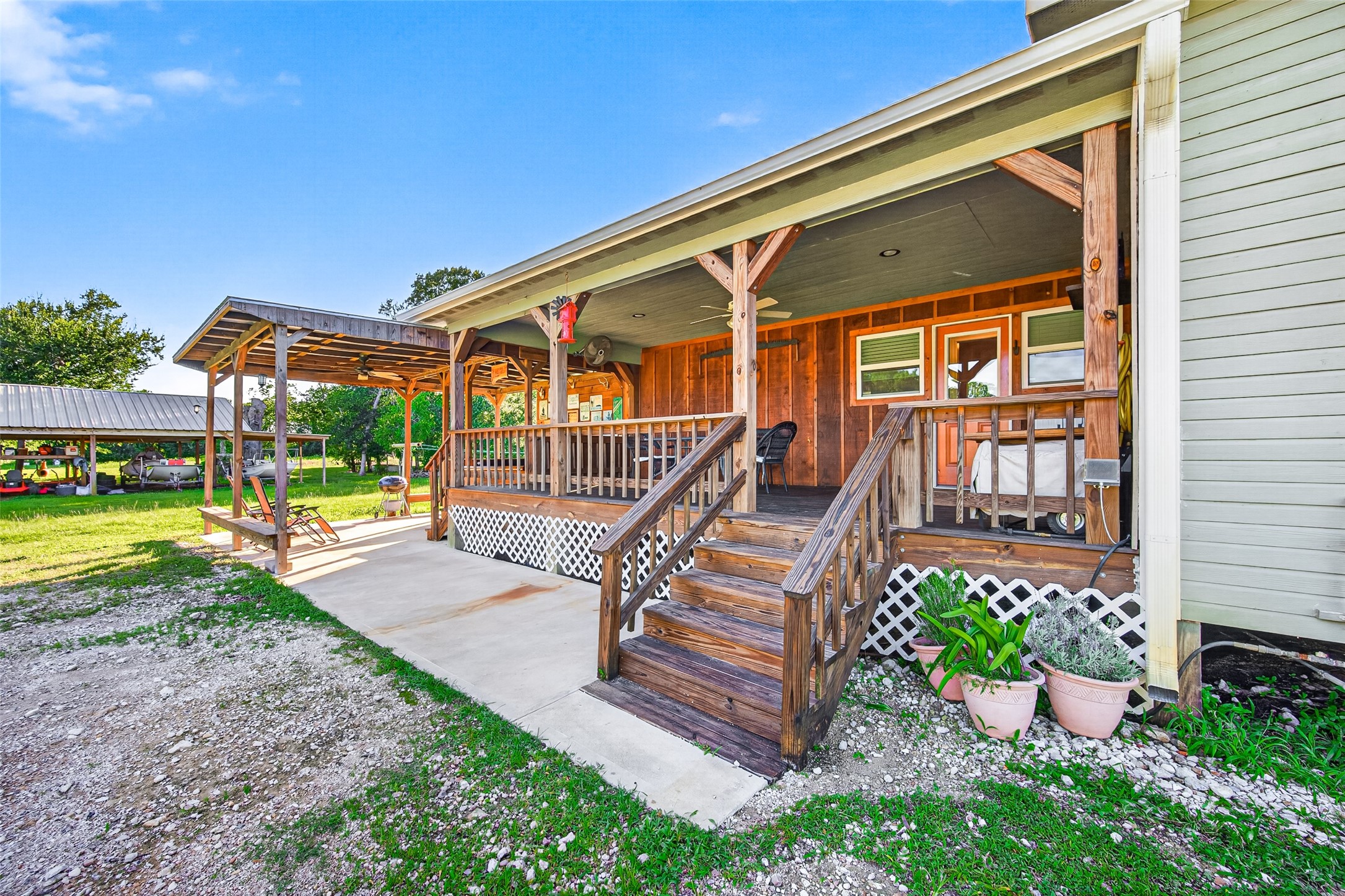 2240 Meyer Road Beasley, TX 77417 - Photo 20 of 29 Amazing side porch (attic above is insulated)