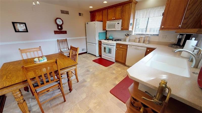 48 May Avenue McKees Rocks, PA 15136 - Photo 5 of 16 Nicely updated kitchen with Corian counter tops
