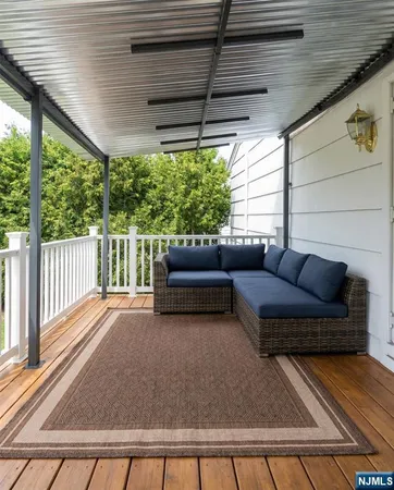a view of a chairs and table in the patio