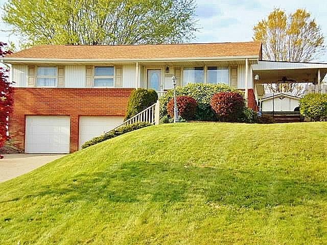 1016 McGovern Road Houston, PA 15342 - Photo 1 of 25 Beautiful quality constructed brick & vinyl ranch home in the Allison Plan neighborhood is well maintained and ready for you to move in! Gorgeous Fresh landscaping! Double wide cement drive and 2 car garage!