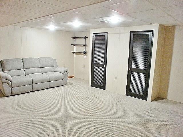 1016 McGovern Road Houston, PA 15342 - Photo 22 of 25 Large Lower Level Gameroom with Brand New Ceiling and Ceiling Lighting and great storage closets!