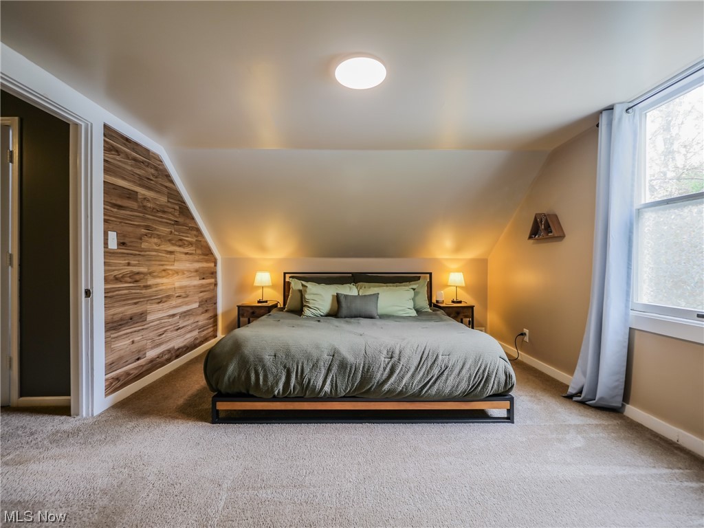 1240 Churchill Road Lyndhurst, OH 44124 - Photo 19 of 30 Bedroom featuring light colored carpet and lofted ceiling