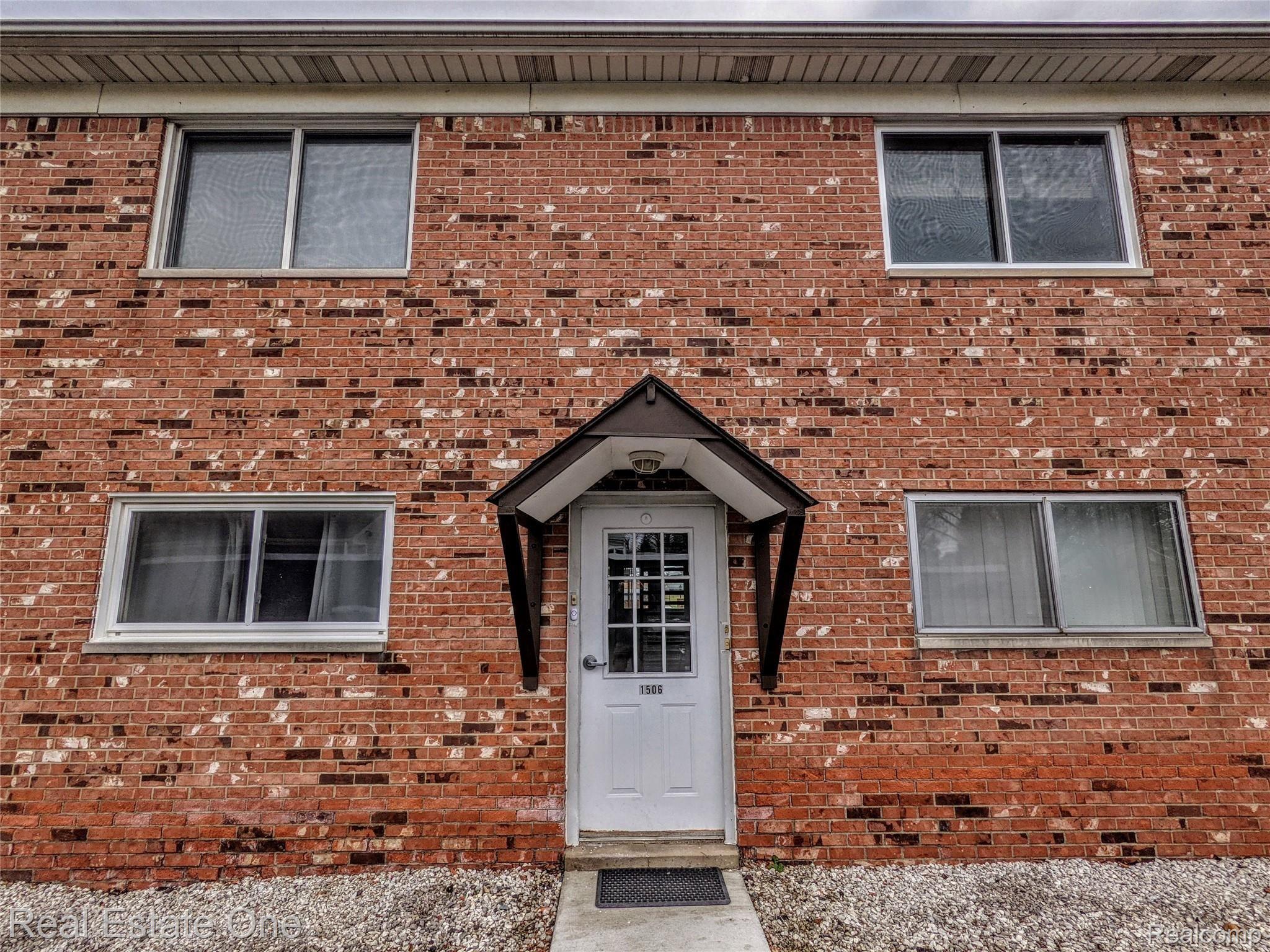 1506 Normandy Road, Unit 210 Royal Oak, MI 48073 - Photo 24 of 25 Rear entry door