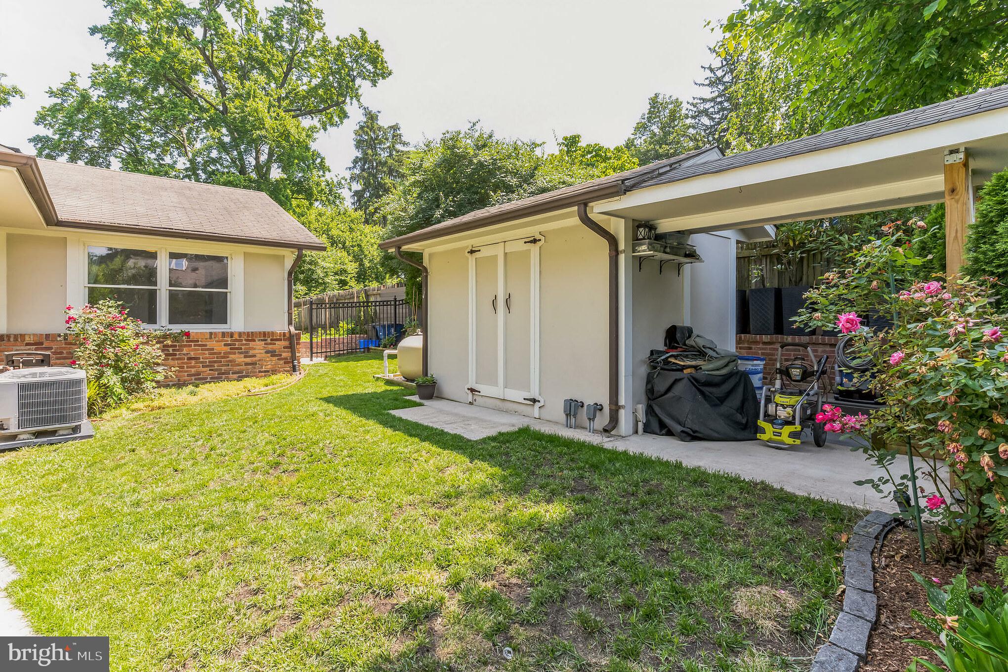 9329 Harvey Road Silver Spring, MD 20910 - Photo 32 of 40 a view of a house with backyard and sitting area