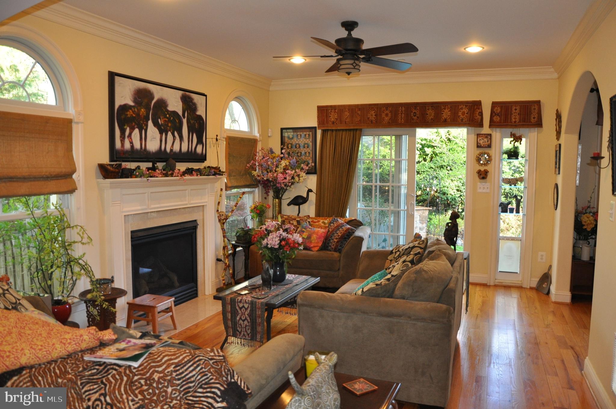 299 Halsey Road Annapolis, MD 21401 - Photo 9 of 61 Family room with gas fireplace, ceiling fan