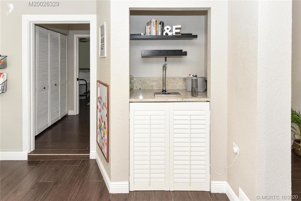945 Sunset Road West Palm Beach, FL 33401 - Photo 22 of 31 a view of an entryway with wooden floor
