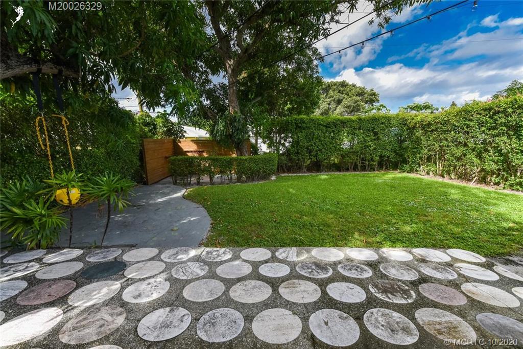 945 Sunset Road West Palm Beach, FL 33401 - Photo 5 of 31 a view of a yard with plants