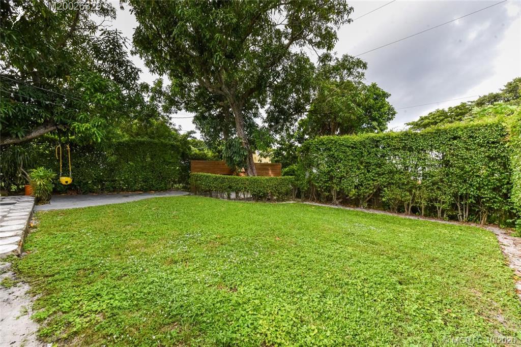 945 Sunset Road West Palm Beach, FL 33401 - Photo 9 of 31 a view of a garden