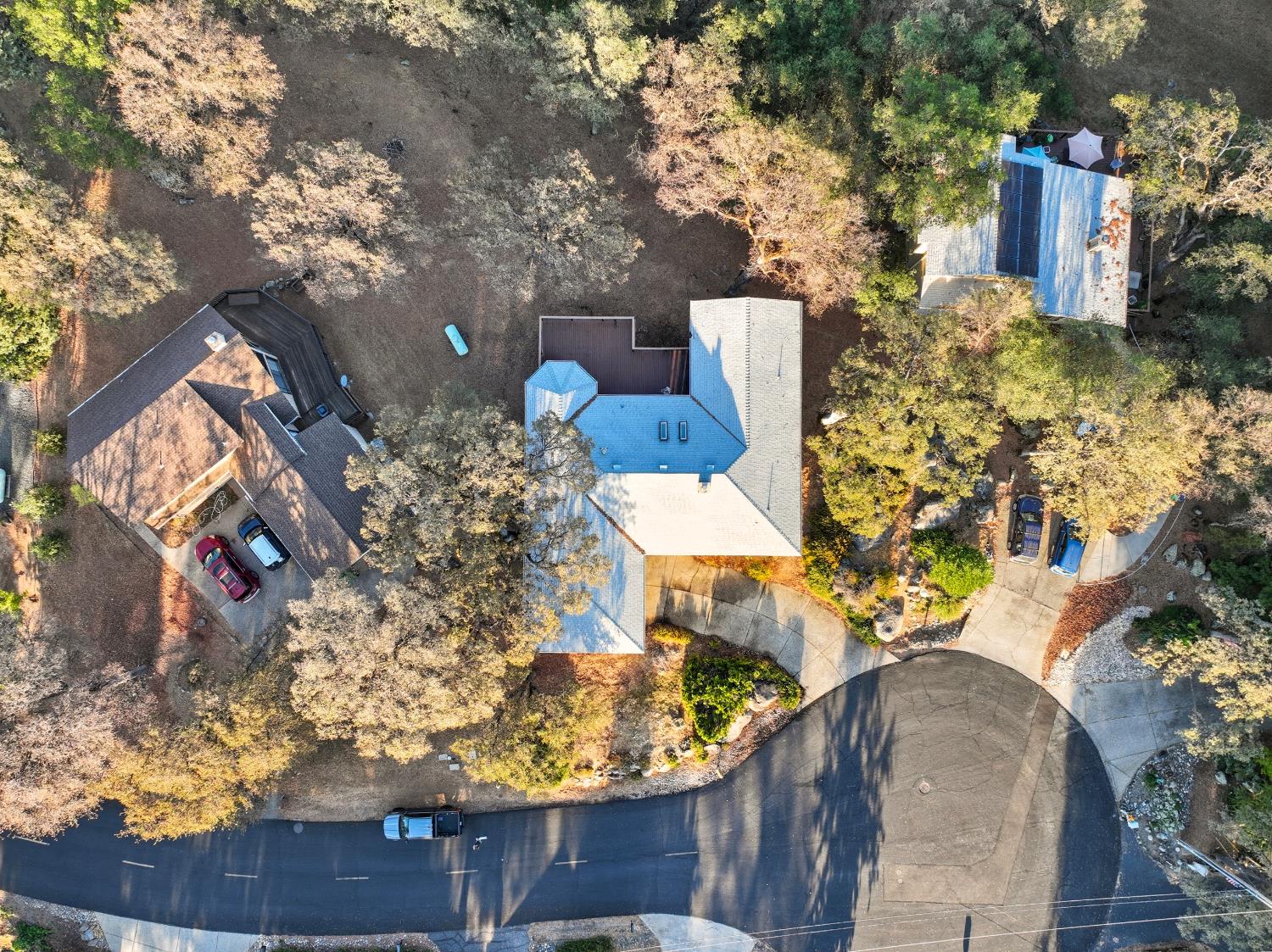 11585 Linnet Court Penn Valley, CA 95946 - Photo 36 of 53 view of a wooden house with a yard and trees