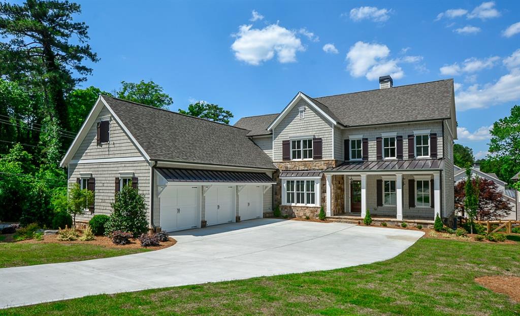 460 Danube Road Northeast Atlanta, GA 30342 - Photo 1 of 1 front view of house with a yard