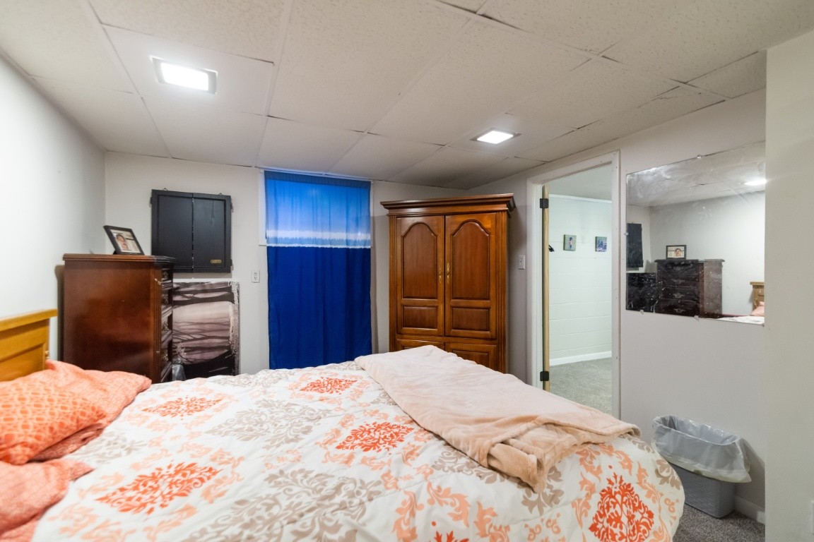 739 Thompson Road Pegram, TN 37143 - Photo 21 of 35 a bedroom with a bed and a television