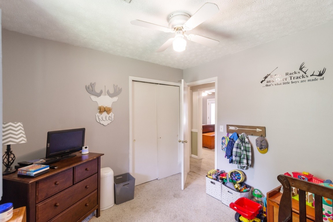 739 Thompson Road Pegram, TN 37143 - Photo 23 of 35 a view of a workspace with furniture and toys