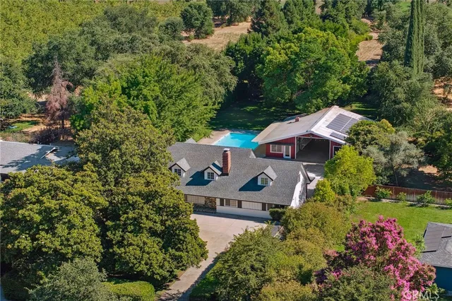 an aerial view of a house with a garden