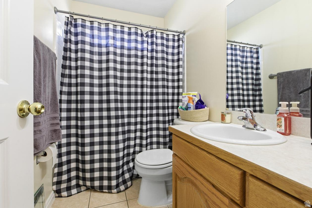 619 East 1st S Street, Unit S Preston, ID 83263 - Photo 6 of 16 Bathroom featuring a light-toned vanity with an integrated sink and chrome faucet, a mounted mirror, and neutral-toned wall paint