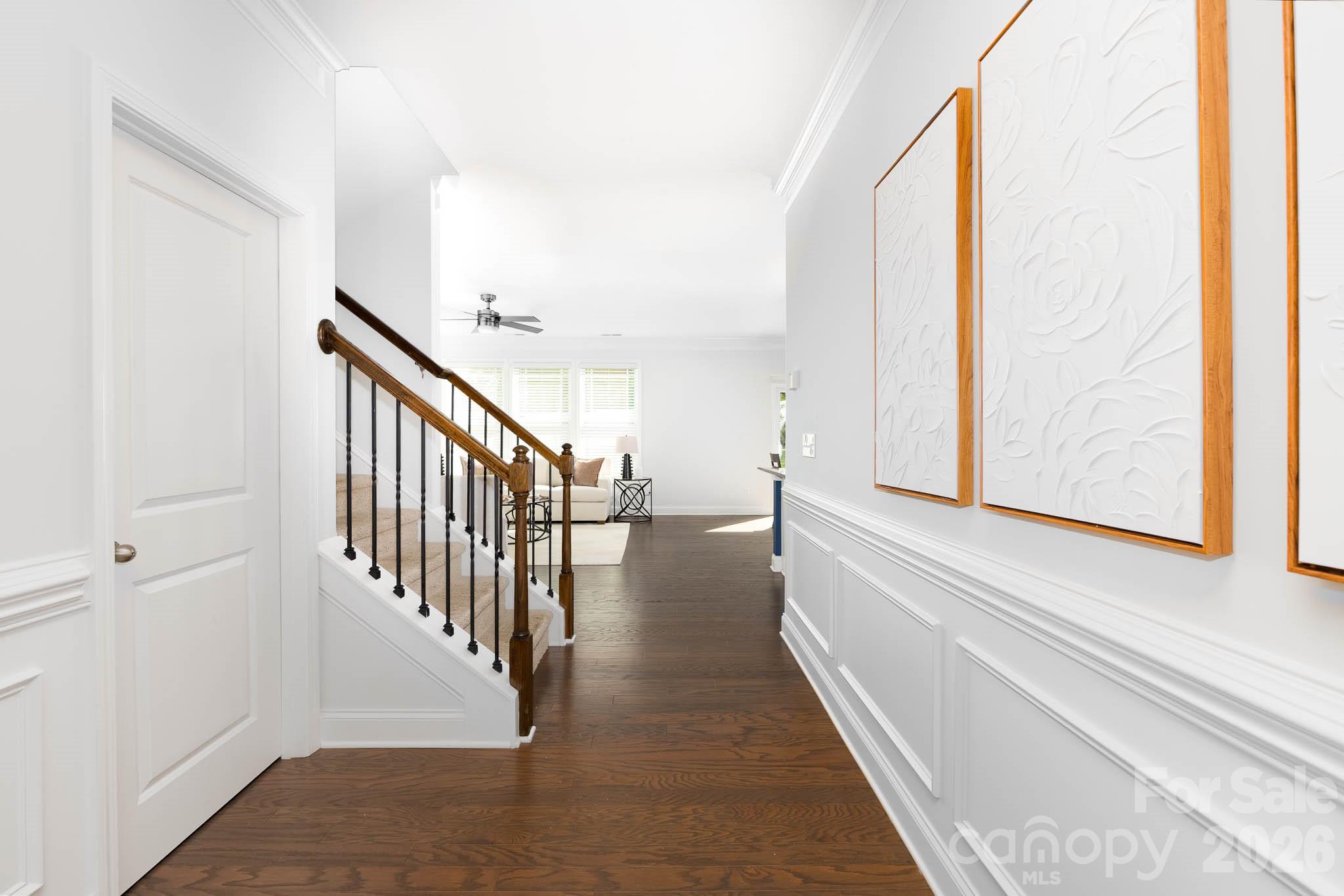 108 Chance Road Mooresville, NC 28115 - Photo 4 of 37 a view of a hallway with window and stairs