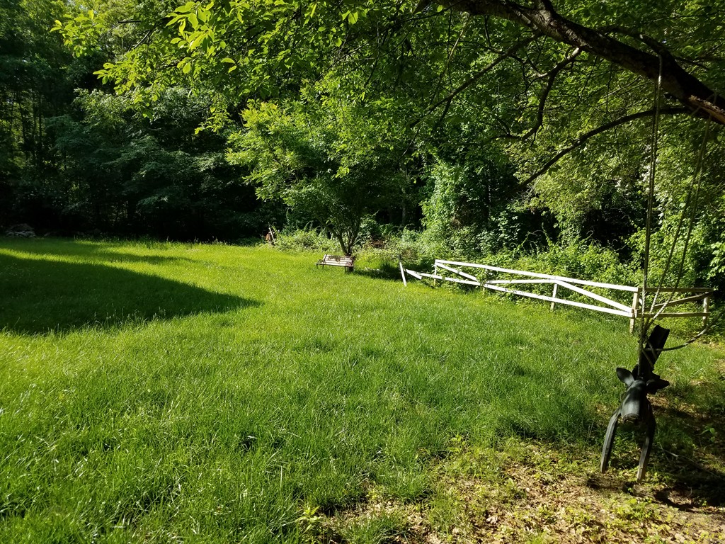 166 Hathaway Road Acushnet, MA 02743 - Photo 3 of 14 a view of field with grass and trees