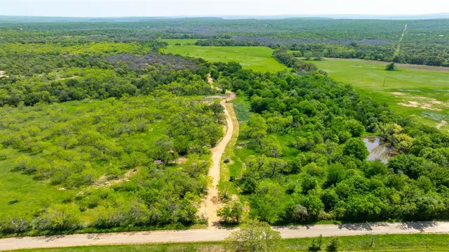 a view of a yard with an outdoor space