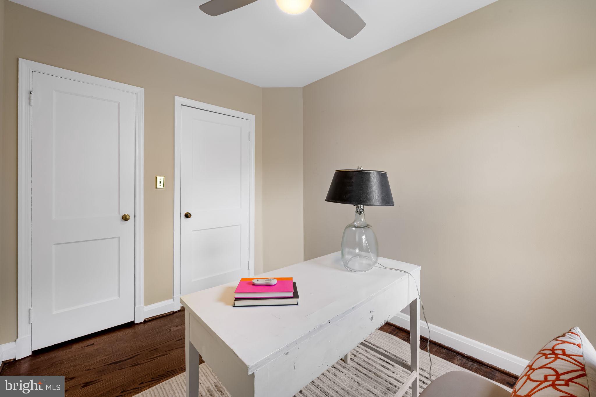 210 Stanmore Road Baltimore, MD 21212 - Photo 17 of 39 a view of a kitchen area with furniture and wooden floor