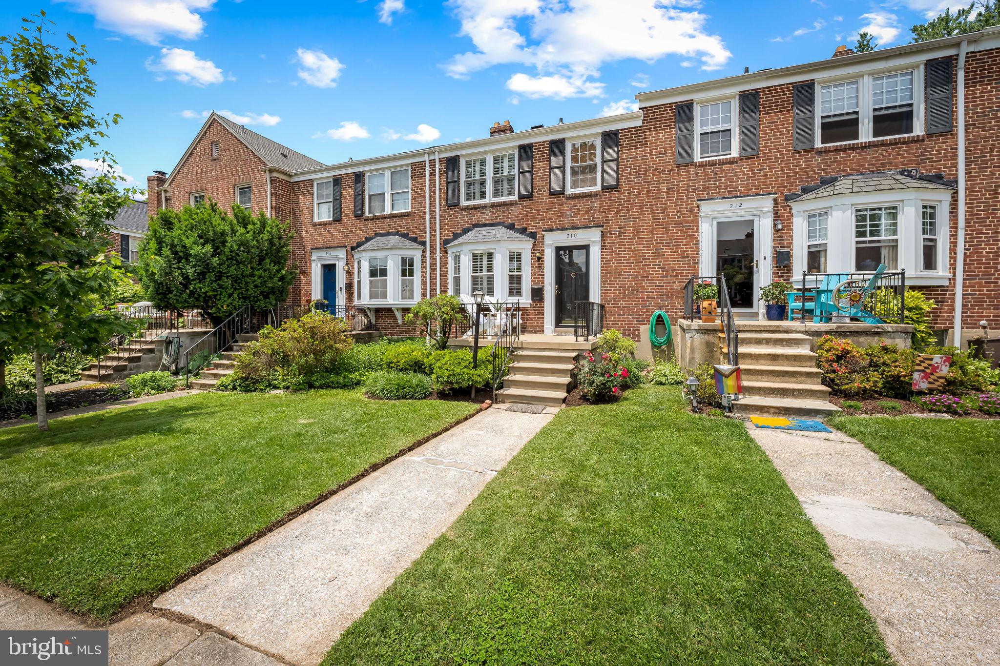 210 Stanmore Road Baltimore, MD 21212 - Photo 2 of 39 a front view of a house with a yard