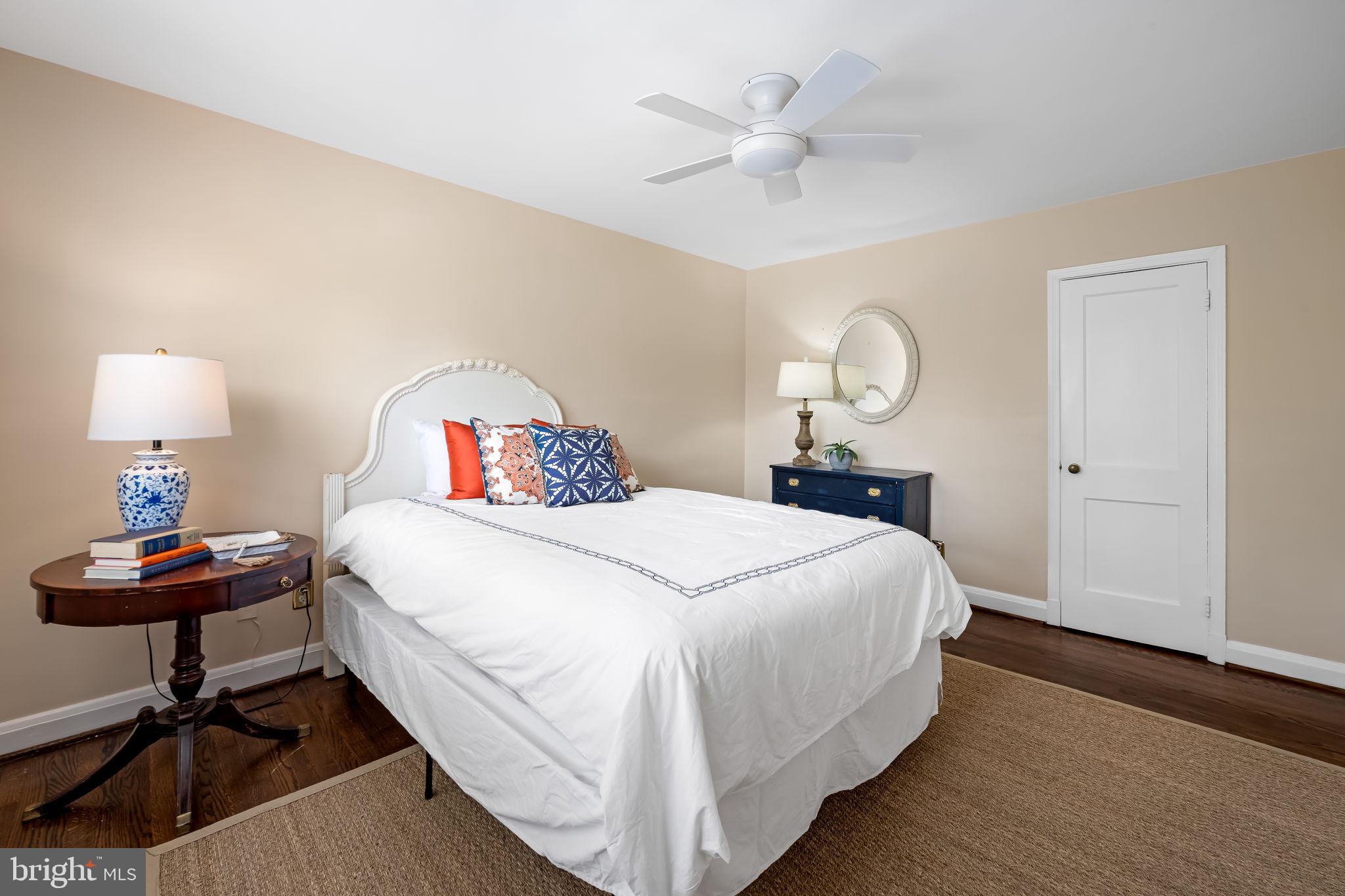 210 Stanmore Road Baltimore, MD 21212 - Photo 21 of 39 a bedroom with a bed and a chandelier