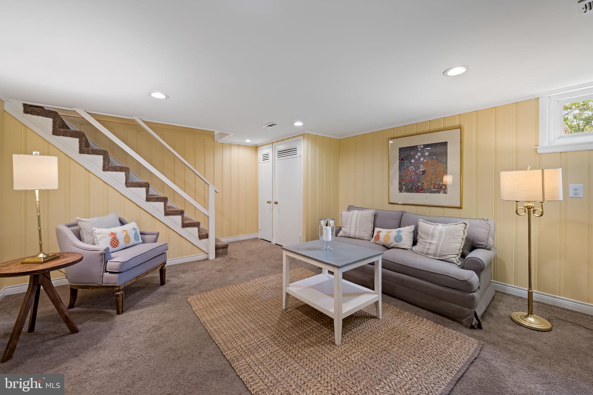 210 Stanmore Road Baltimore, MD 21212 - Photo 26 of 39 a living room with furniture and a wooden floor