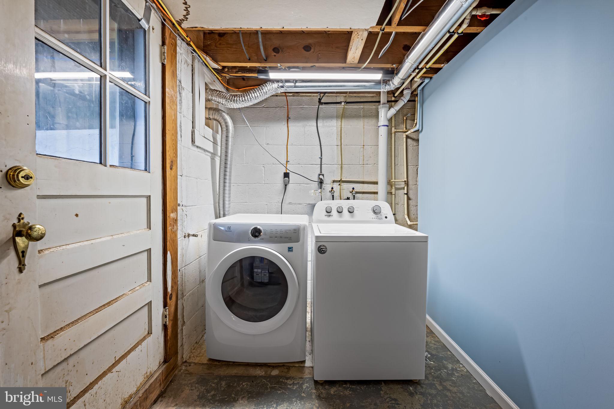 210 Stanmore Road Baltimore, MD 21212 - Photo 30 of 39 a utility room with dryer and washer