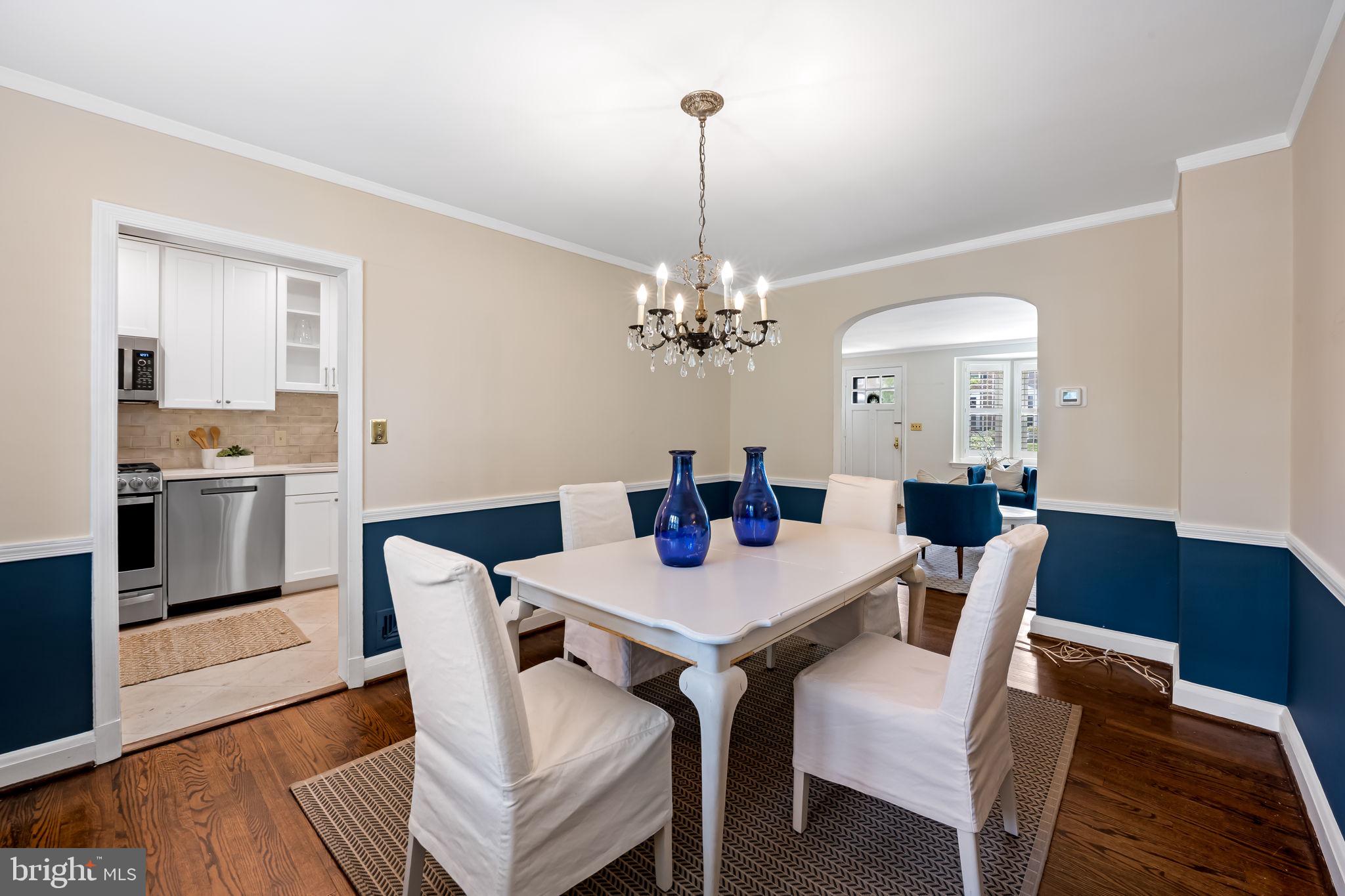 210 Stanmore Road Baltimore, MD 21212 - Photo 10 of 39 a view of a dining room with furniture window and wooden floor