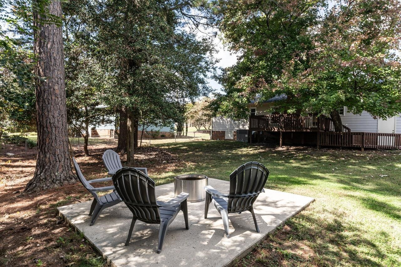 3300 Blue Ridge Road Raleigh, NC 27612 - Photo 25 of 25 a view of a chairs in a patio