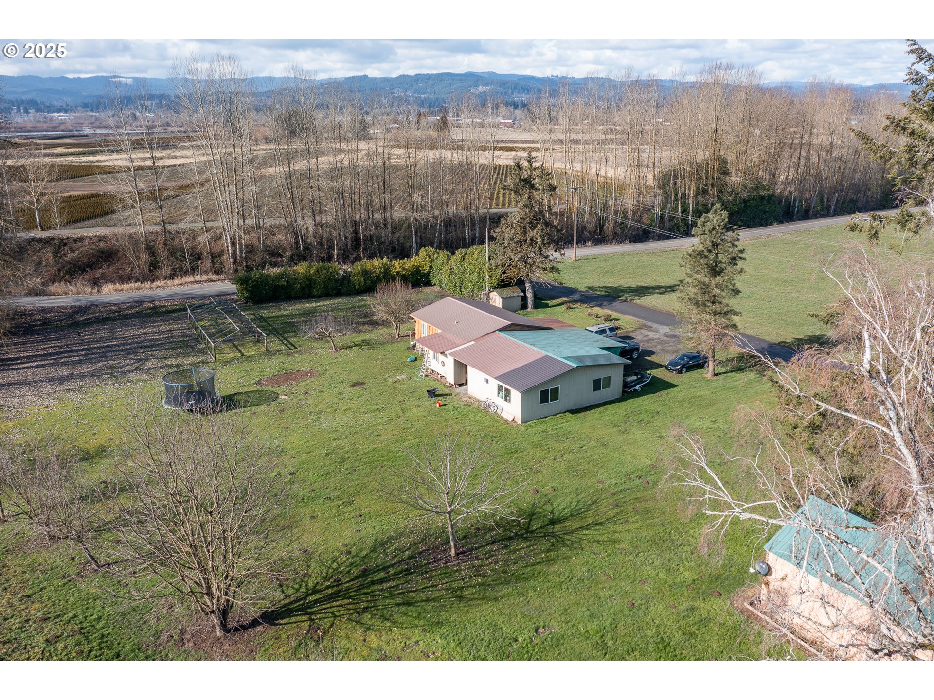 35308 Riverside Lane Scappoose, OR 97056 - Photo 20 of 48 a view of an outdoor space and yard