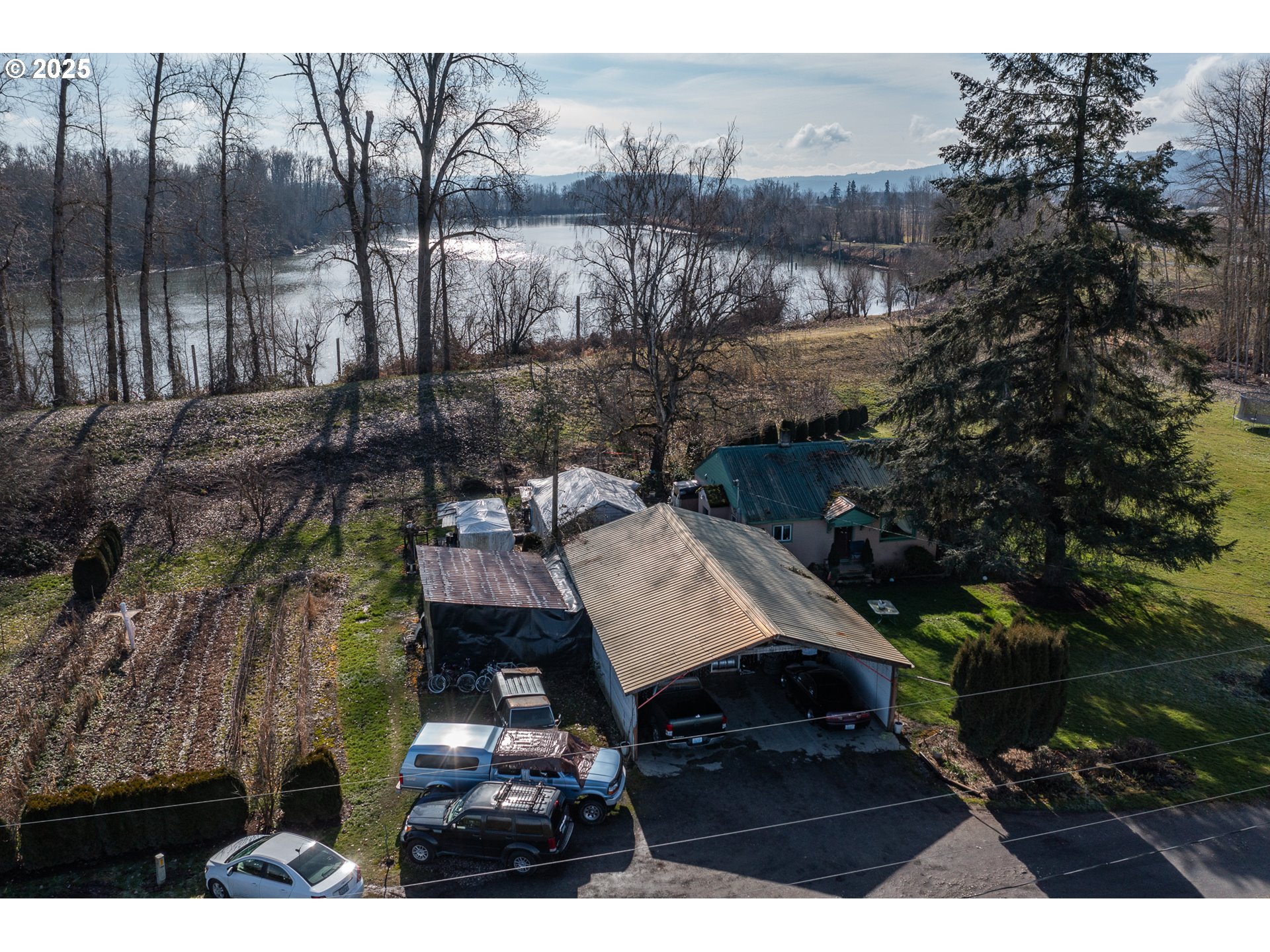 35308 Riverside Lane Scappoose, OR 97056 - Photo 23 of 48 a view of a house with a street