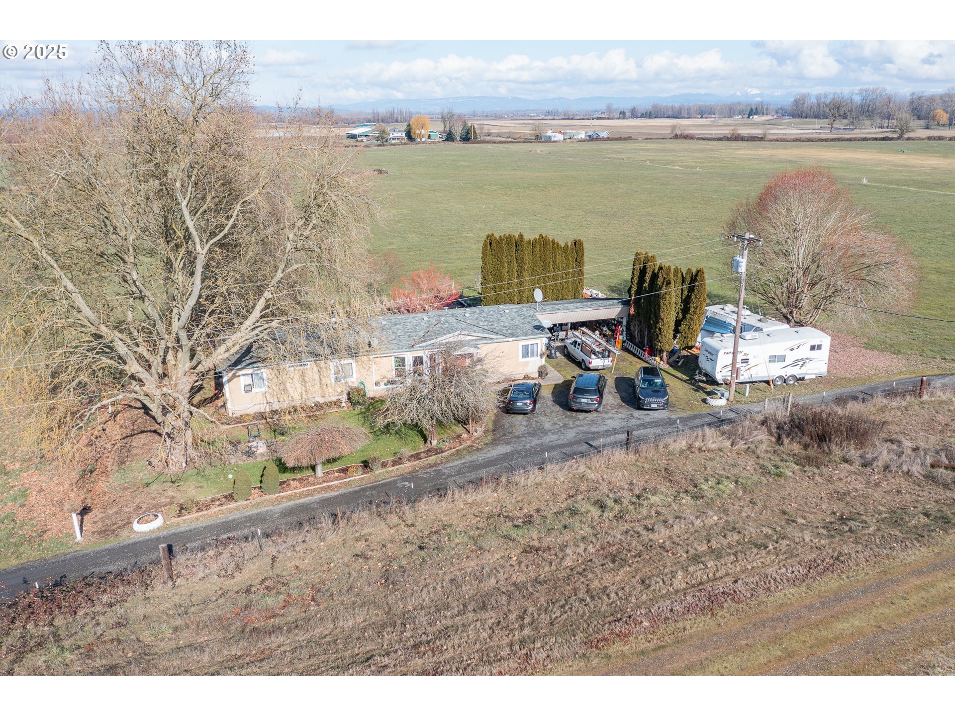 35308 Riverside Lane Scappoose, OR 97056 - Photo 24 of 48 a view of a lake with a mountain