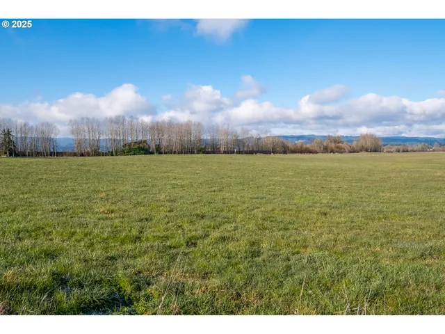 a view of an ocean and sunset