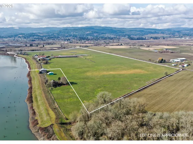 a view of a swimming pool and an outdoor seating