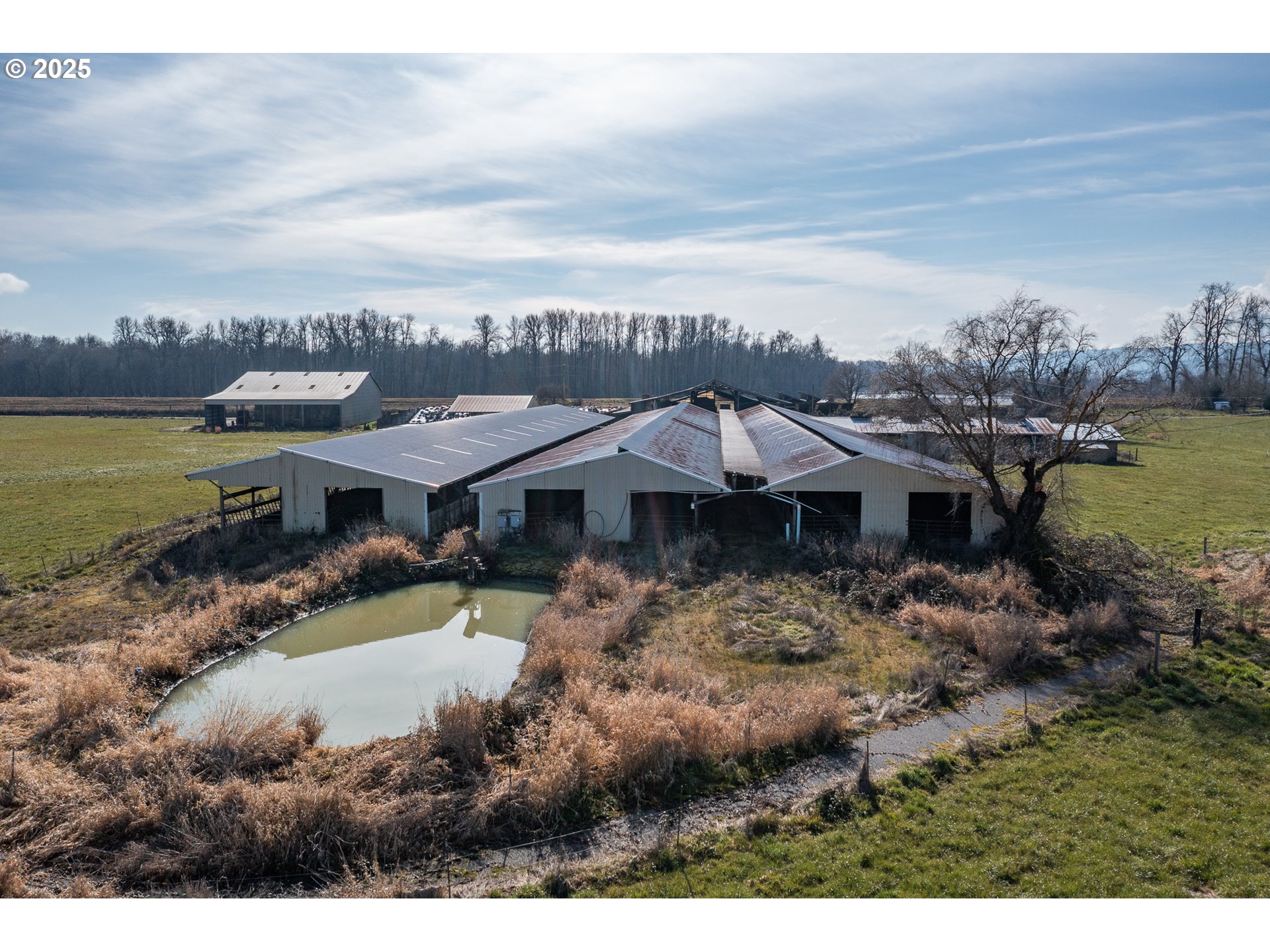 35308 Riverside Lane Scappoose, OR 97056 - Photo 38 of 48 a view of a house with a yard and lake view