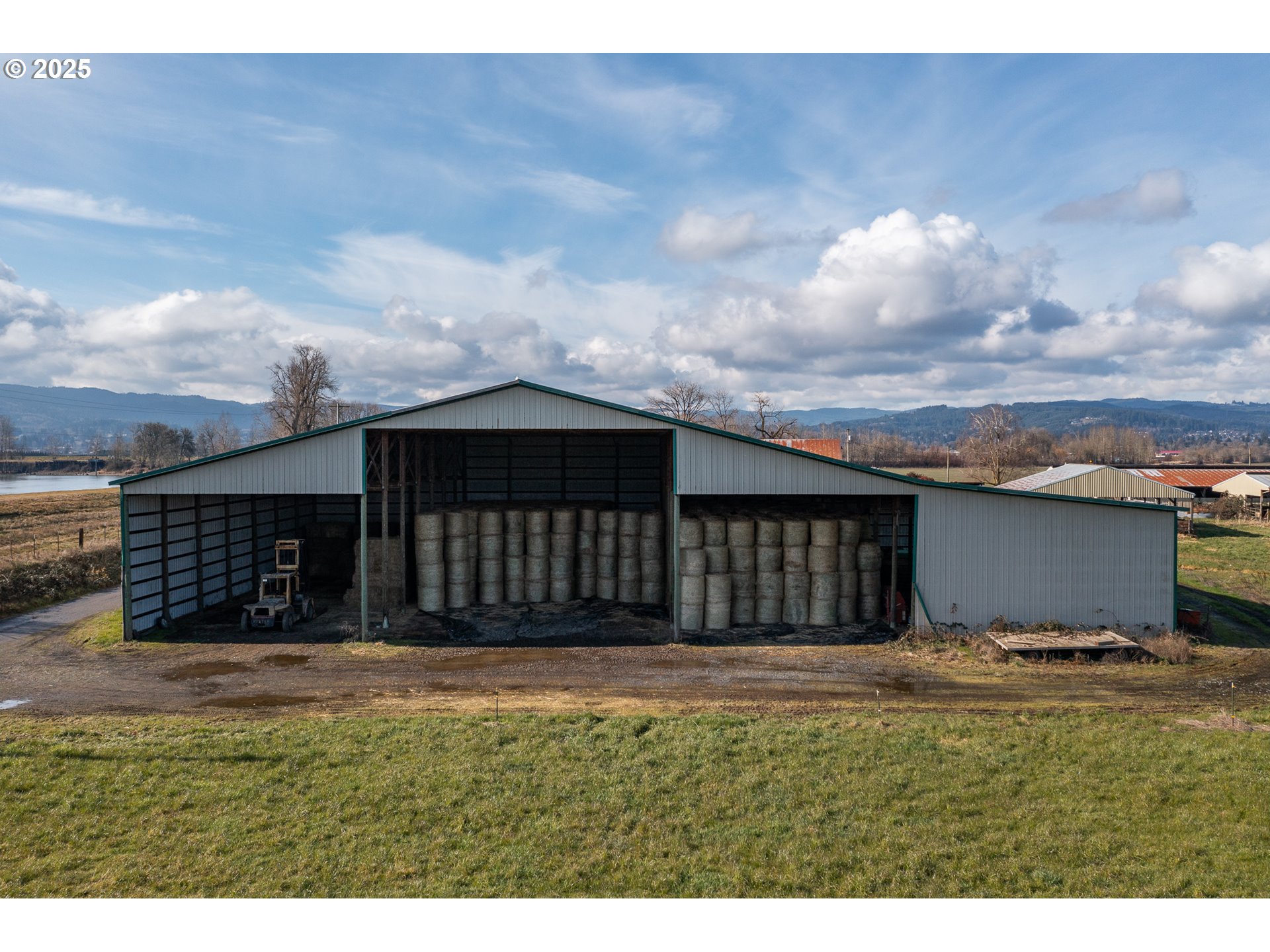 35308 Riverside Lane Scappoose, OR 97056 - Photo 10 of 48 a front view of a house with a yard