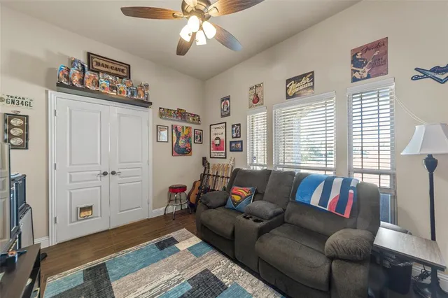a living room with furniture and a window